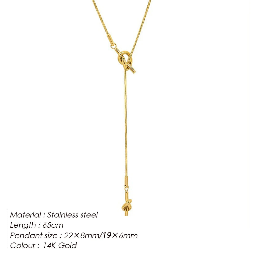 eManco “Inner Dialogue Pendant” — Two Knots, One Chain: For the Woman Who Talks to Herself Before She Talks to the World