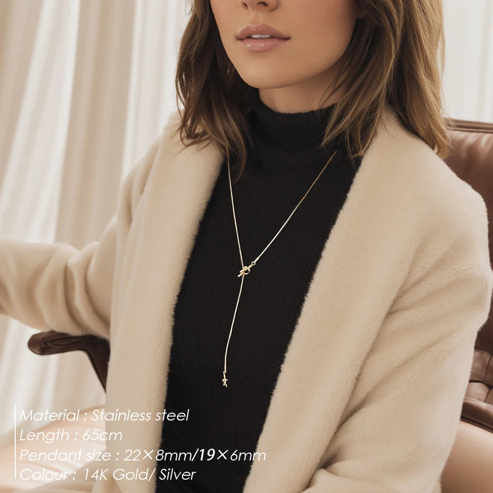 eManco “Inner Dialogue Pendant” — Two Knots, One Chain: For the Woman Who Talks to Herself Before She Talks to the World