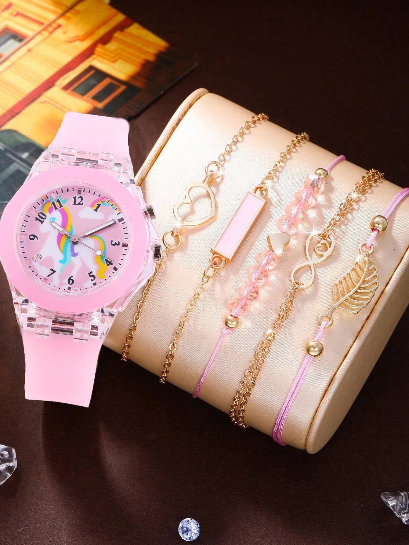 Children's wristwatch set featuring unicorn silicone quartz watch and feather bracelet, emits light, does not include the box