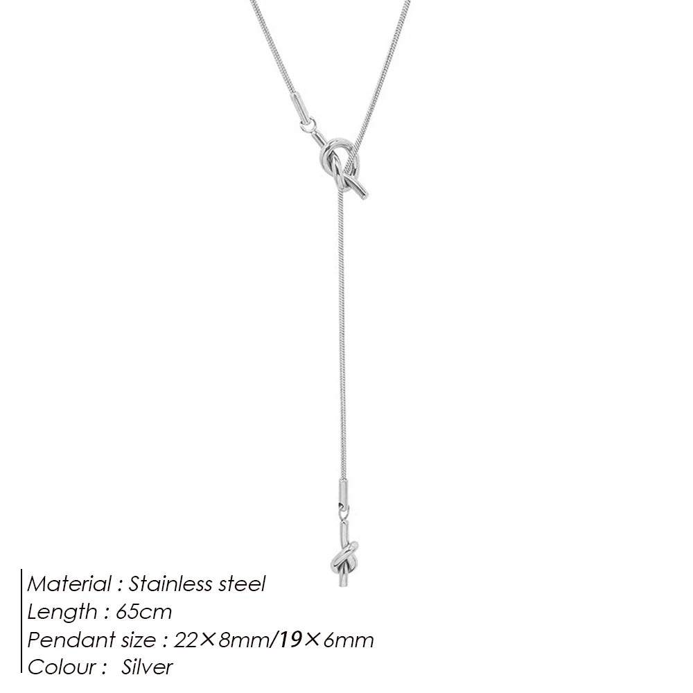 eManco “Inner Dialogue Pendant” — Two Knots, One Chain: For the Woman Who Talks to Herself Before She Talks to the World